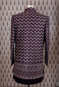 Elegant plum purple sherwani with all-over embroidery and brooch, paired with tailored trousers. Perfect for weddings, receptions, and festive wear.