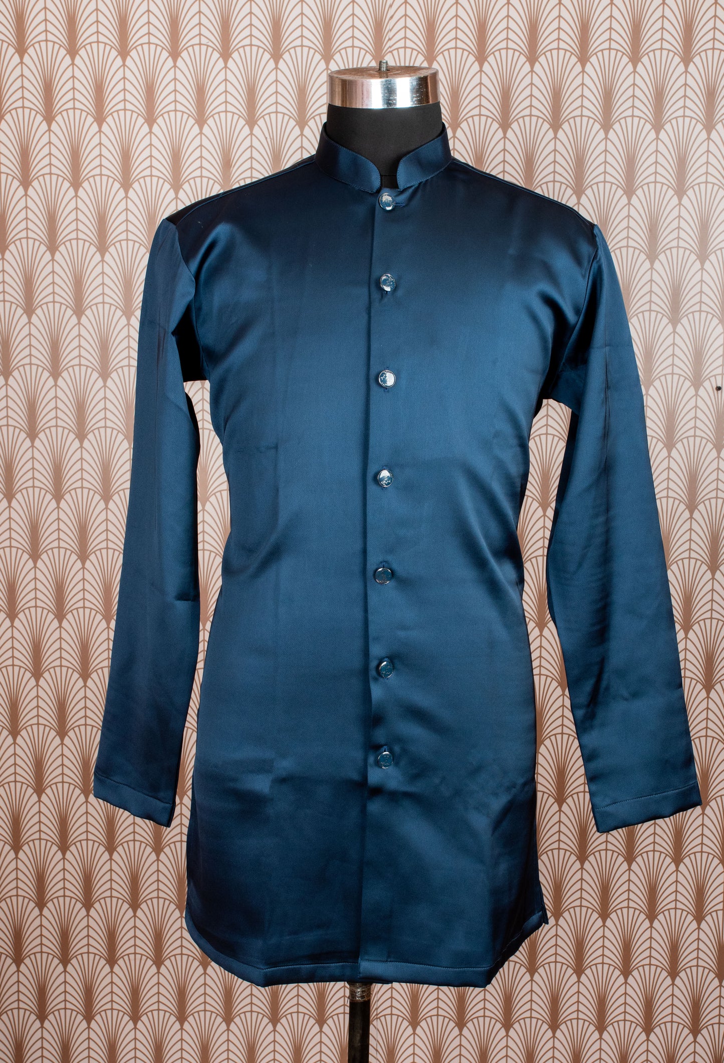 Royal blue velvet sherwani with intricate embroidery, satin kurta, and trousers. Perfect for weddings, receptions, and festive occasions.