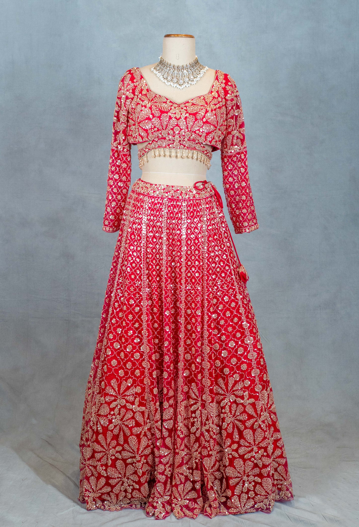 Red Designer Crop Top Lehenga with Heavy Gold Embroidery & Dupatta – Bridal & Festive Ensemble