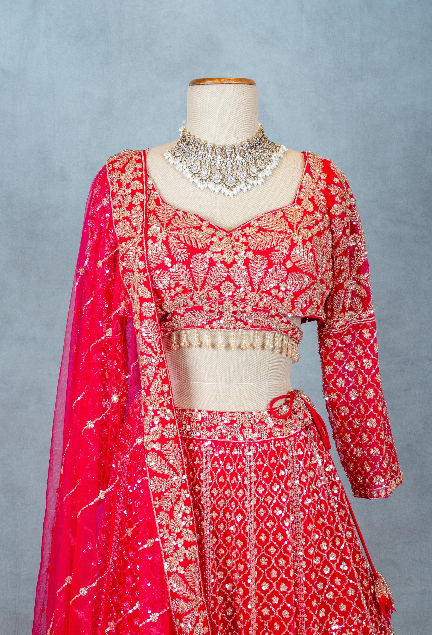 Red Designer Crop Top Lehenga with Heavy Gold Embroidery & Dupatta – Bridal & Festive Ensemble