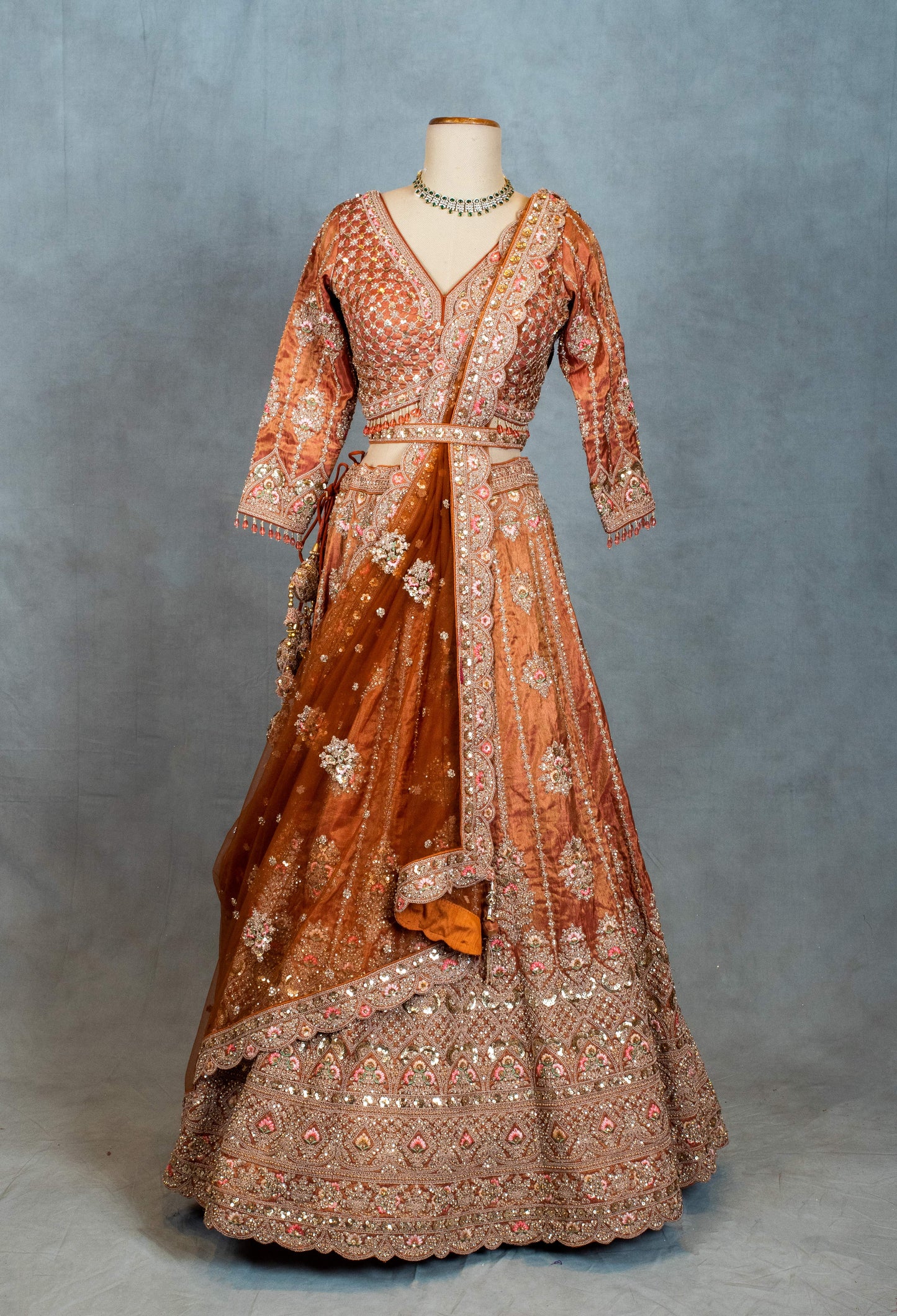 Burnt Orange Heavy Embroidered Crop Top Lehenga with Mirror & Zari Work – Bridal & Festive Wear