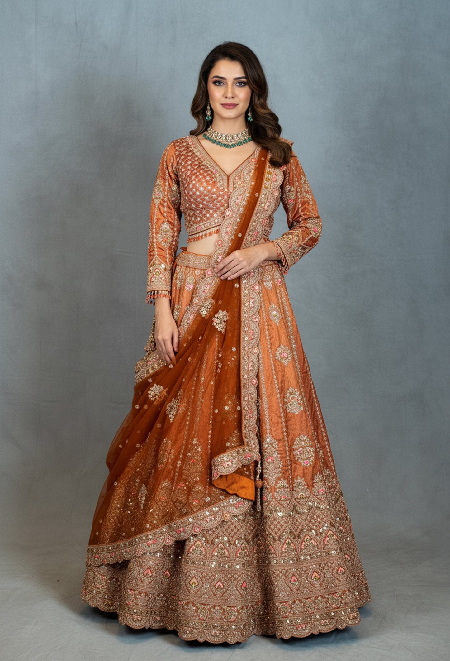 Burnt Orange Heavy Embroidered Crop Top Lehenga with Mirror & Zari Work – Bridal & Festive Wear