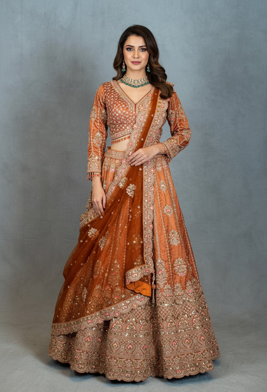 Burnt Orange Heavy Embroidered Crop Top Lehenga with Mirror & Zari Work – Bridal & Festive Wear