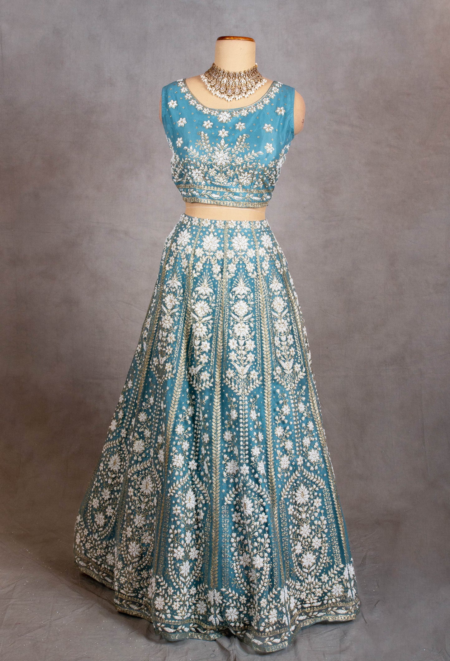 Sky Blue Sleeveless Crop Top Lehenga with White Floral Embroidery & Net Dupatta – Bridesmaid & Festive Wear