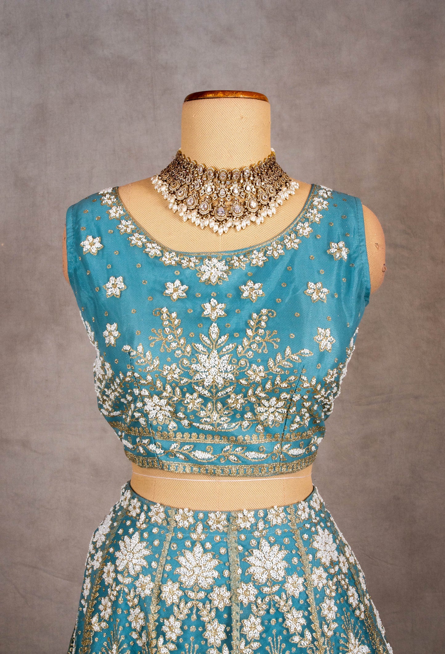 Sky Blue Sleeveless Crop Top Lehenga with White Floral Embroidery & Net Dupatta – Bridesmaid & Festive Wear