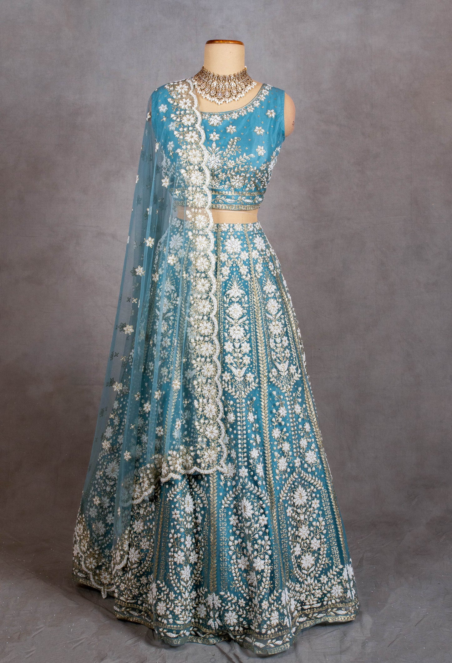 Sky Blue Sleeveless Crop Top Lehenga with White Floral Embroidery & Net Dupatta – Bridesmaid & Festive Wear