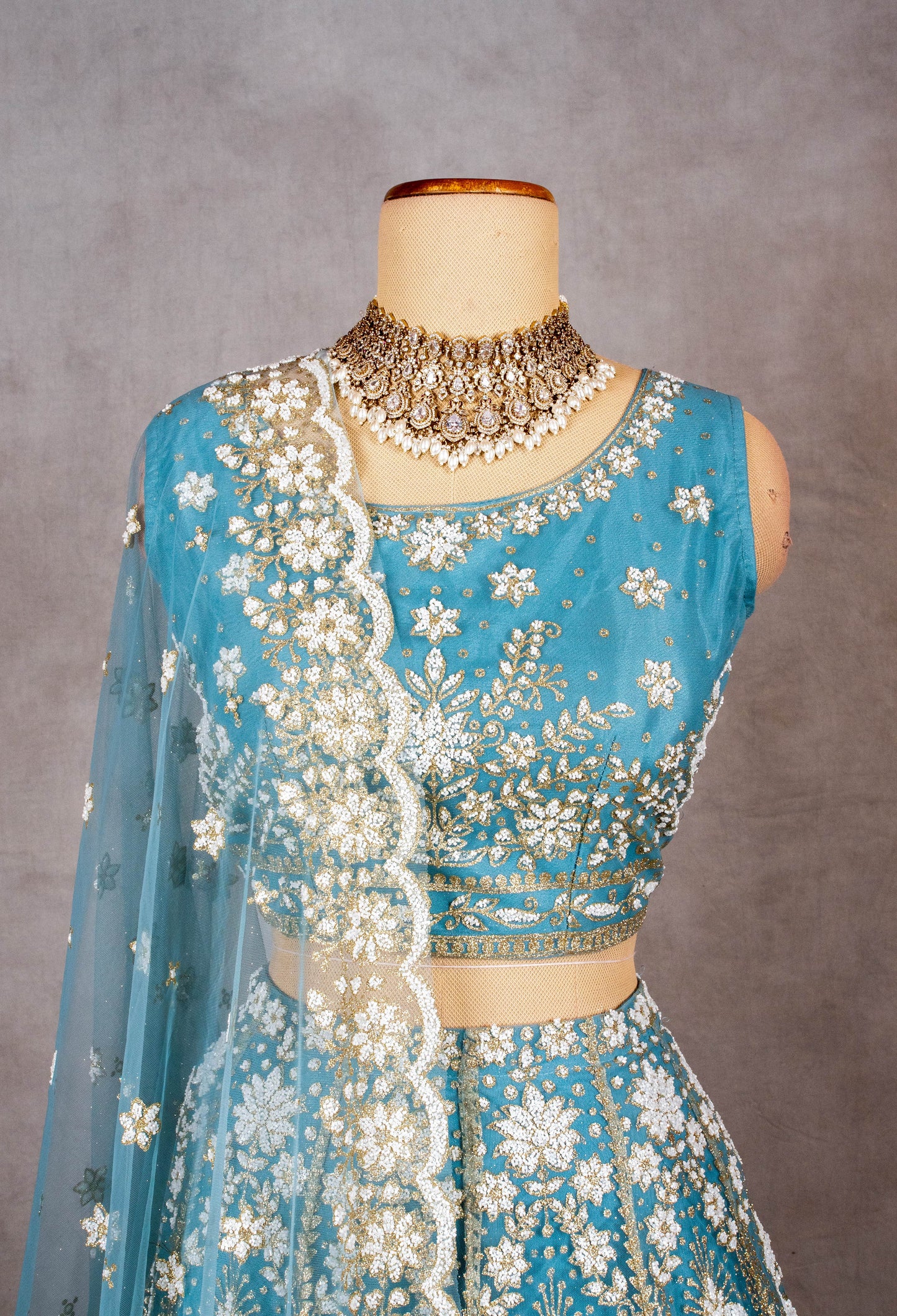 Sky Blue Sleeveless Crop Top Lehenga with White Floral Embroidery & Net Dupatta – Bridesmaid & Festive Wear