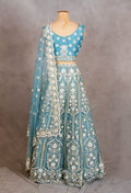 Sky Blue Sleeveless Crop Top Lehenga with White Floral Embroidery & Net Dupatta – Bridesmaid & Festive Wear