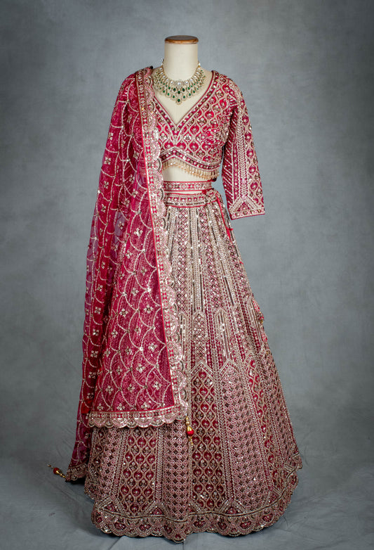 Red bridal lehenga with intricate gold embroidery – product image 2
