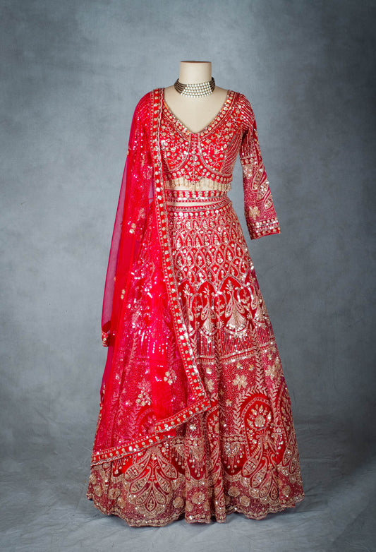 Red bridal lehenga with mirror and sequin embroidery