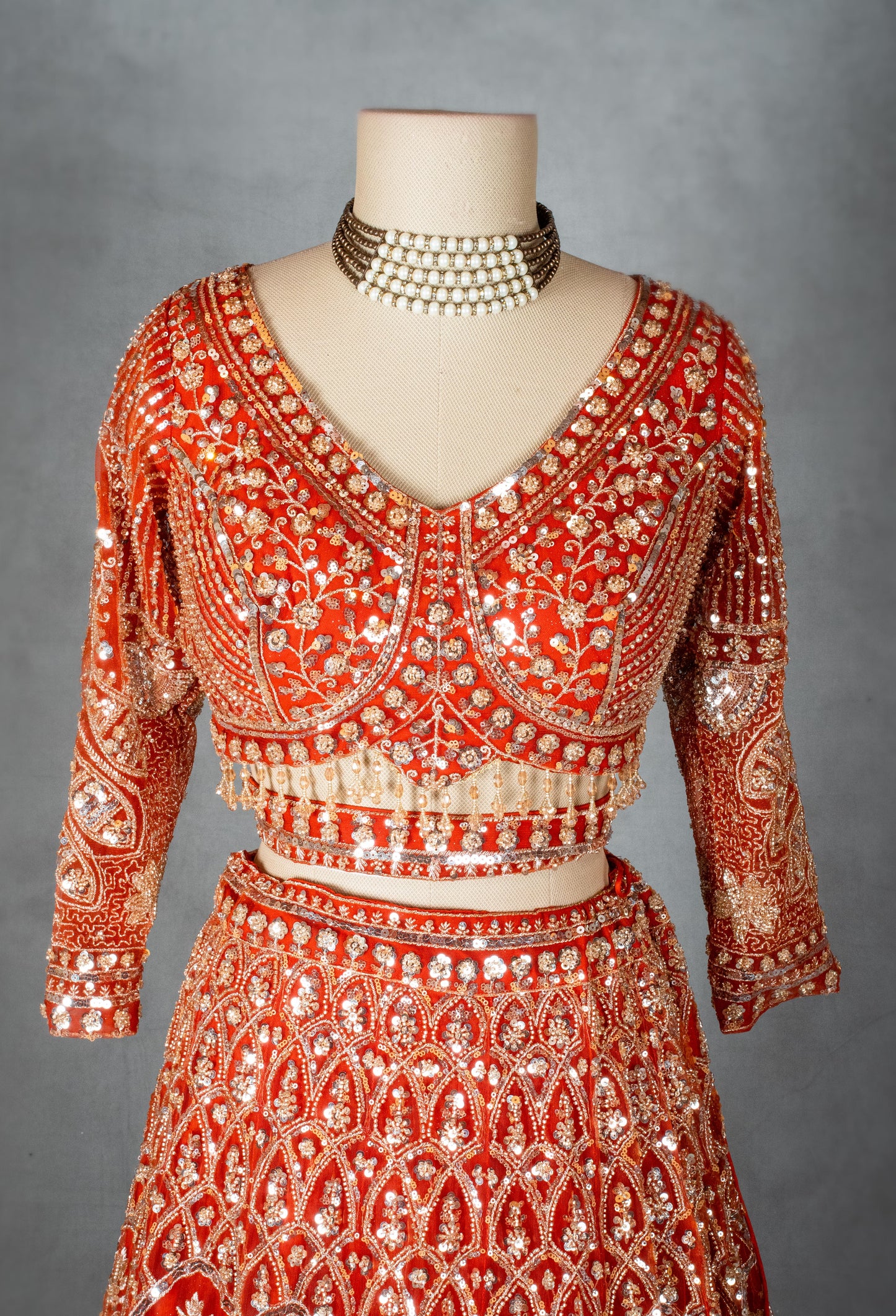 Orange Bridal Zardozi Lehenga with Mirror and Sequin Embroidery