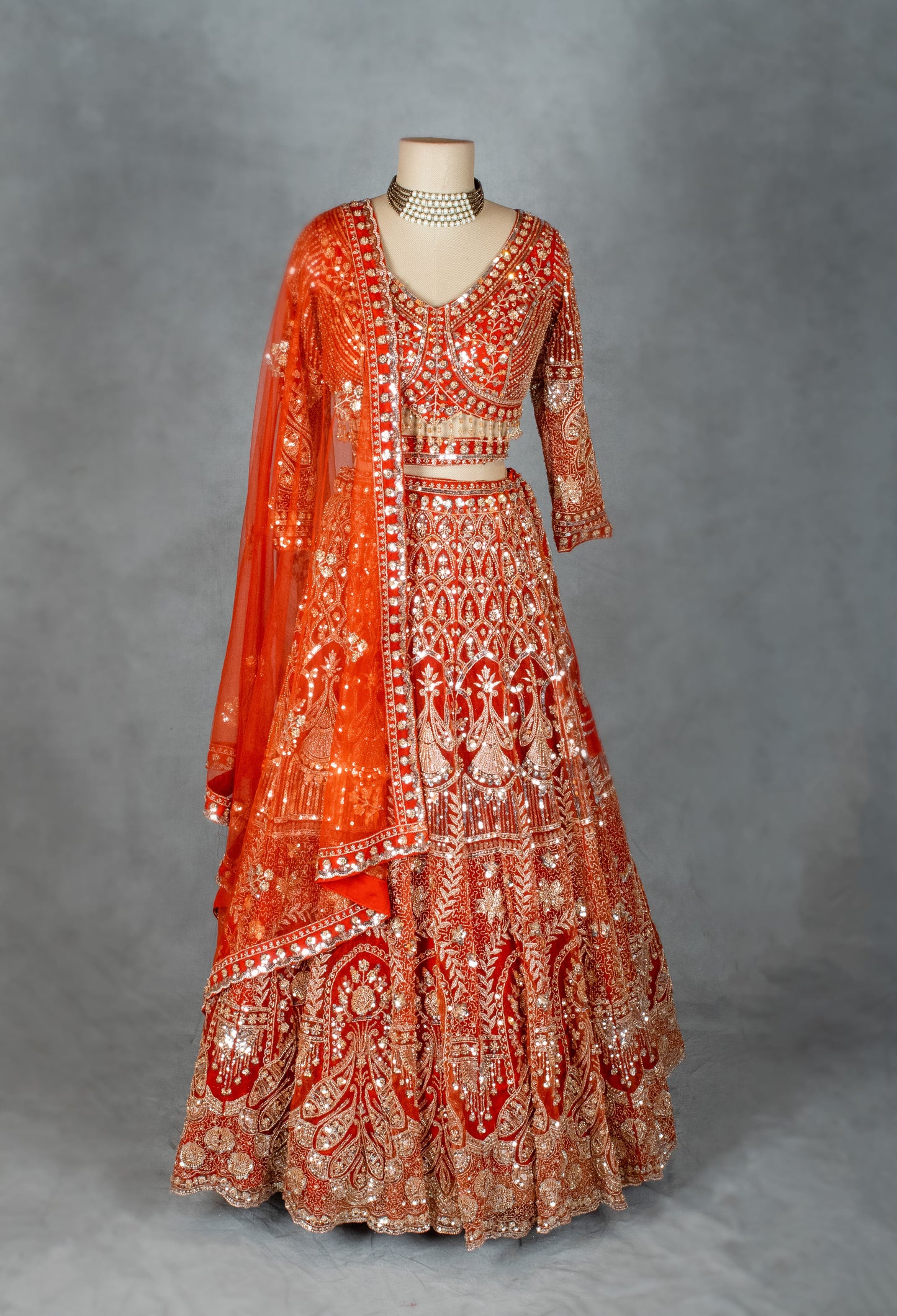 Orange Bridal Zardozi Lehenga with Mirror and Sequin Embroidery