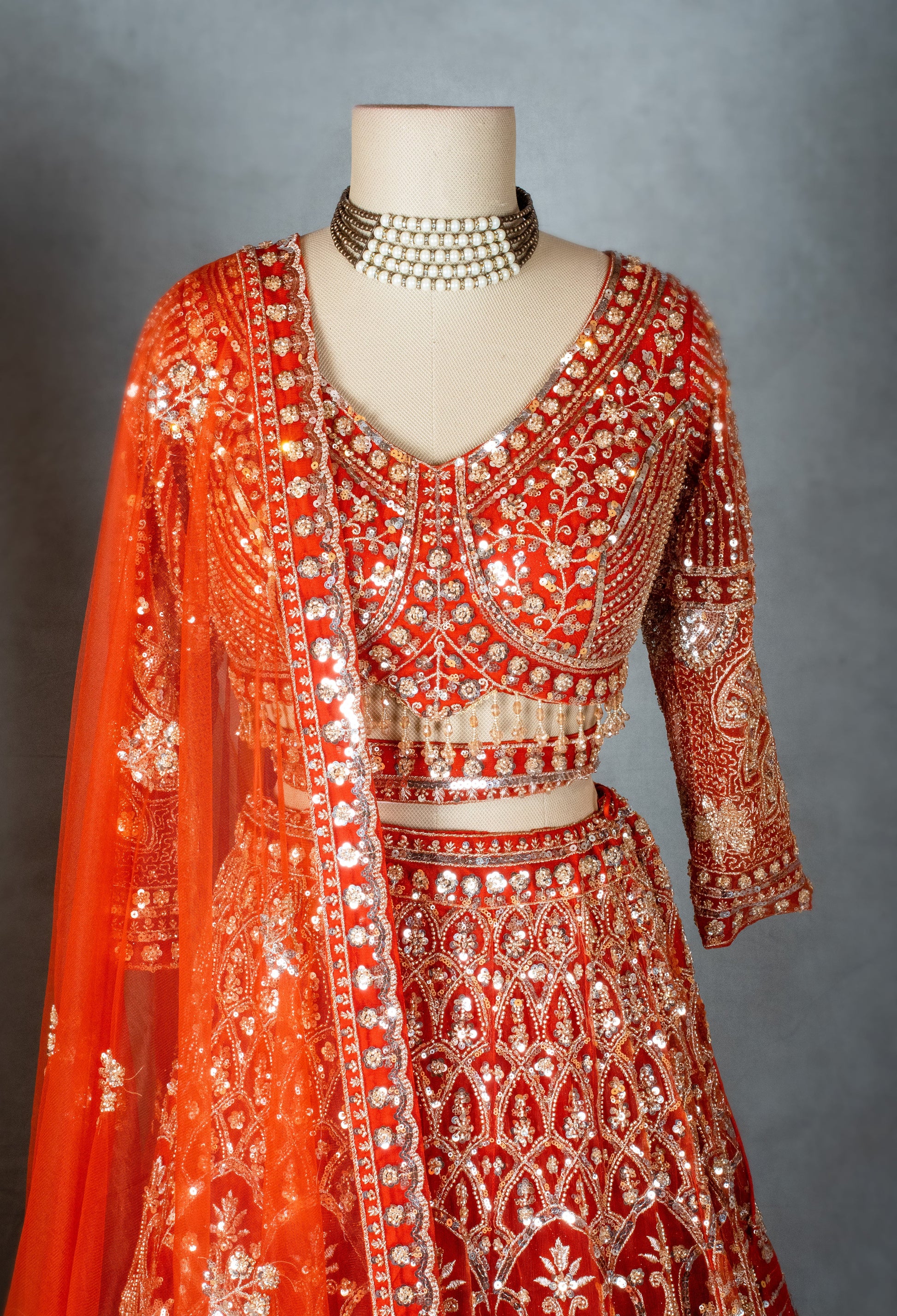 Orange | Orange bridal lehenga set with embroidered net dupatta | 4