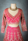 Elegant Pink Bridal Lehenga with Intricate Gold Embroidery - Traditional Indian Wedding Outfit