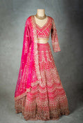 Elegant Pink Bridal Lehenga with Intricate Gold Embroidery - Traditional Indian Wedding Outfit