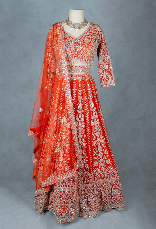 Orange Bridal Lehenga with Intricate Silver Embroidery and Crop Top Blouse