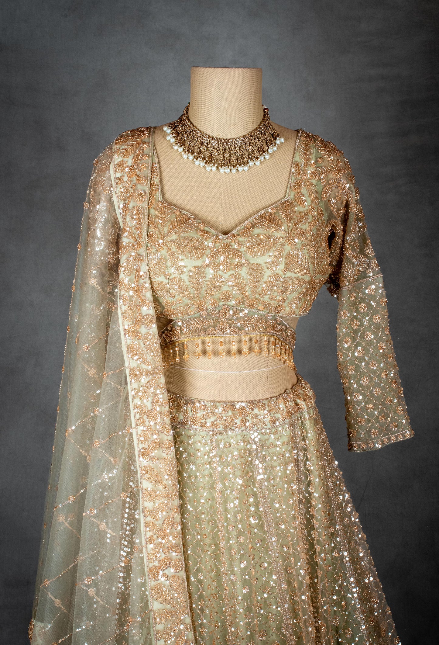 Elegant Gold Embroidered Bridal Lehenga Choli with Net Dupatta
