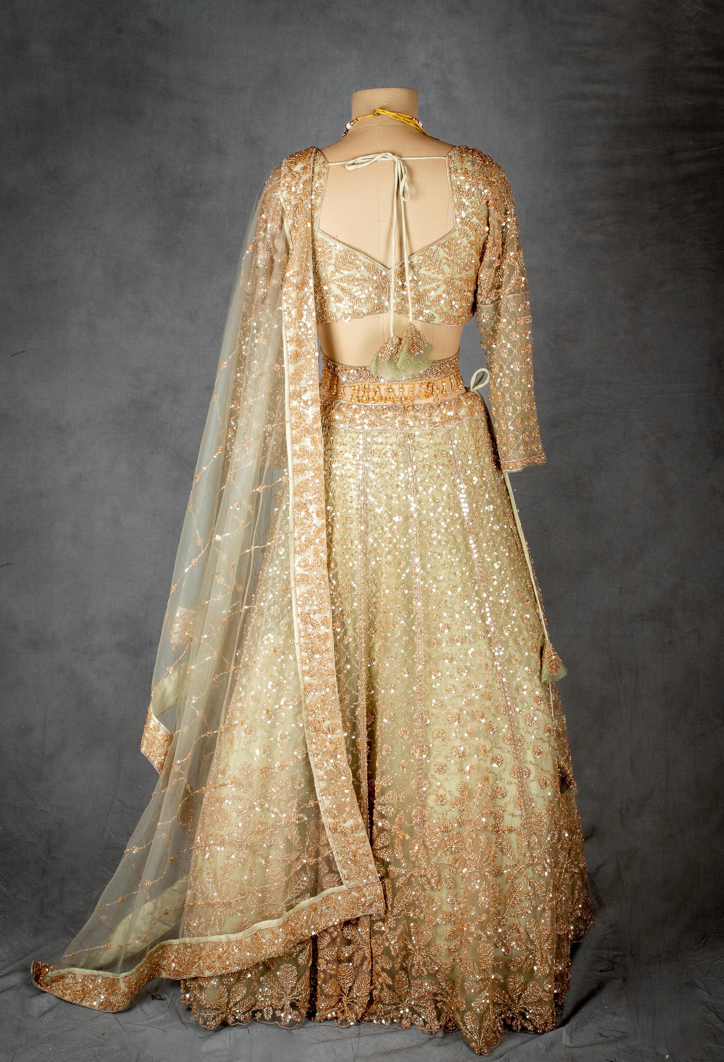 Elegant Gold Embroidered Bridal Lehenga Choli with Net Dupatta