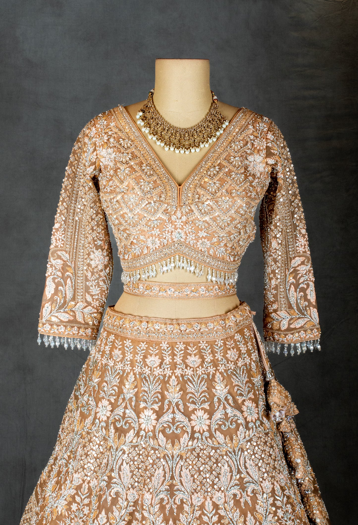 Elegant Beige Embroidered Bridal Lehenga with Net Dupatta & Detailed Work