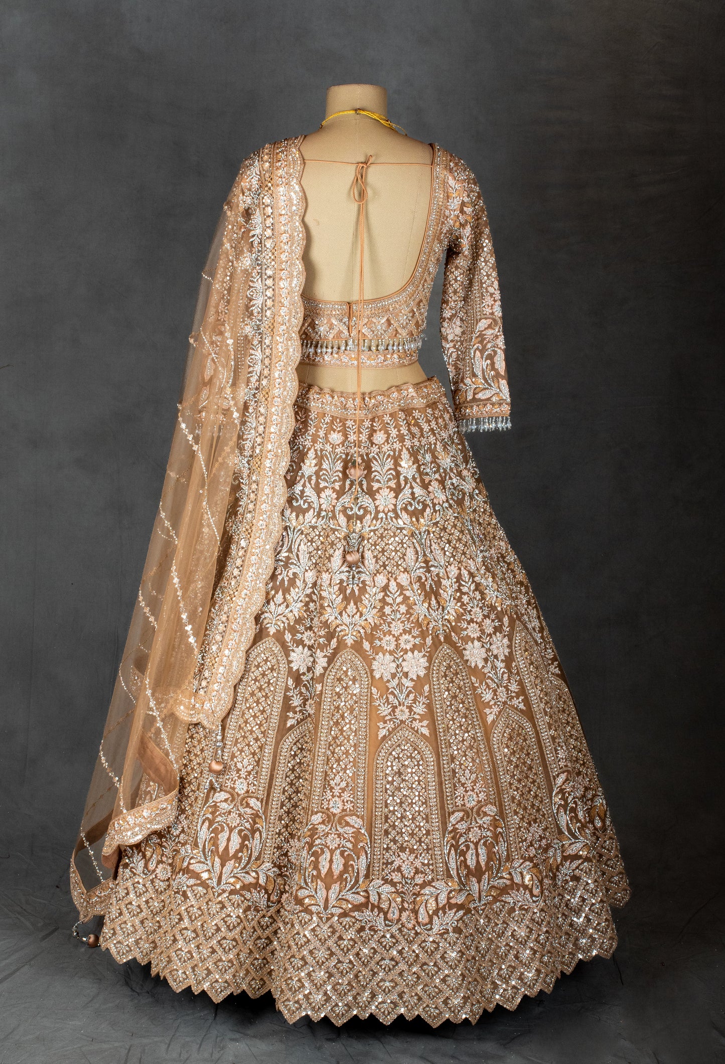 Elegant Beige Embroidered Bridal Lehenga with Net Dupatta & Detailed Work