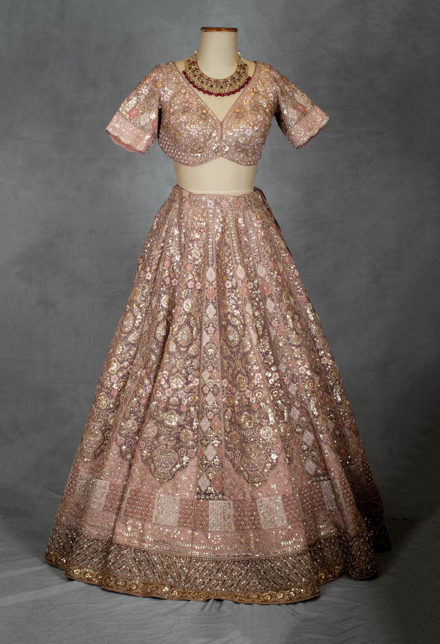 Pastel Dusty Rose Bridal Lehenga with Sequin Embroidery and Net Dupatta