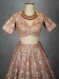 Pastel Dusty Rose Bridal Lehenga with Sequin Embroidery and Net Dupatta