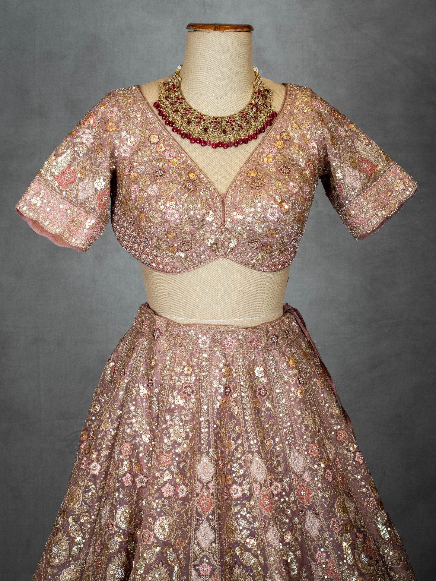 Pastel Dusty Rose Bridal Lehenga with Sequin Embroidery and Net Dupatta