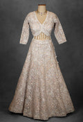 Embroidered Designer Bridal Lehenga in Pastel Beige with Sequins & Zari Work