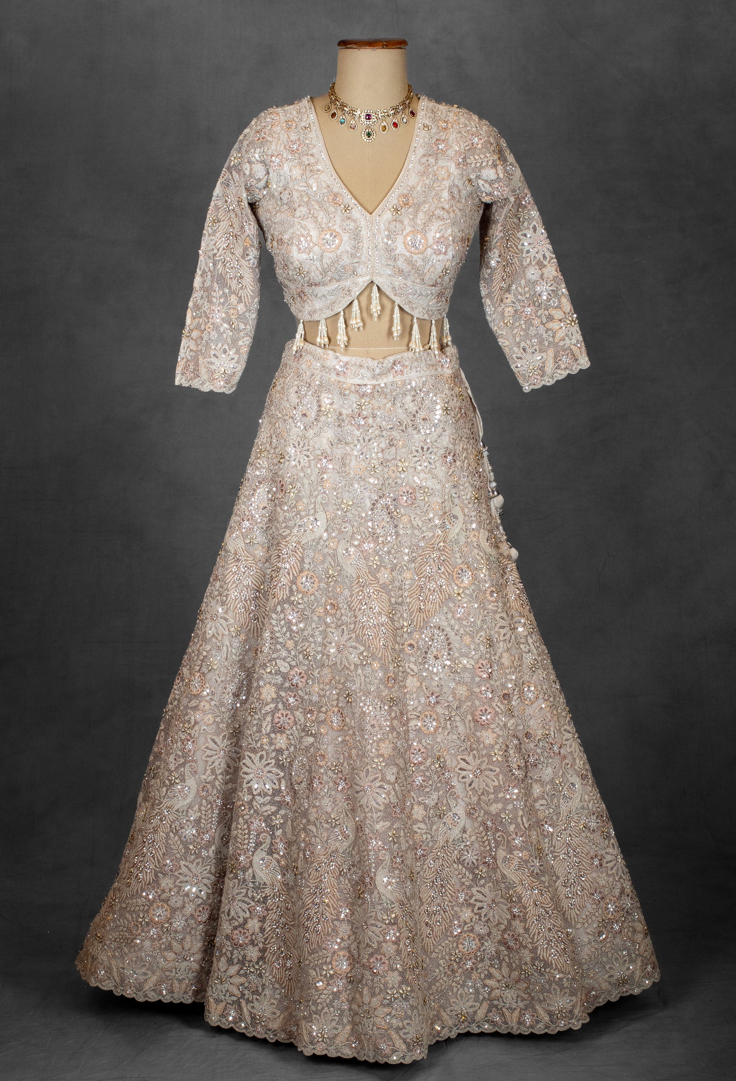 Embroidered Designer Bridal Lehenga in Pastel Beige with Sequins & Zari Work