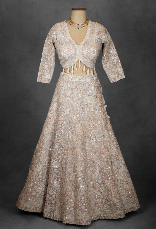 Pastel beige embroidered bridal lehenga with sequins and zari work – product image 2