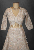 Embroidered Designer Bridal Lehenga in Pastel Beige with Sequins & Zari Work