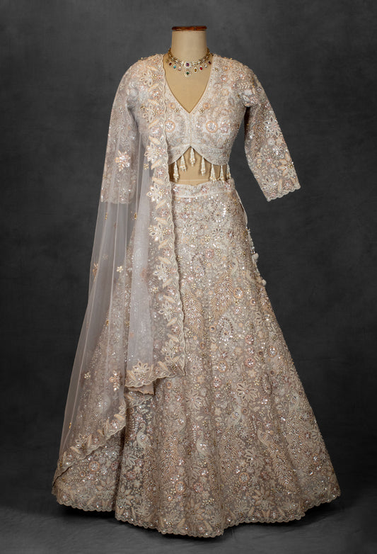 Embroidered Designer Bridal Lehenga in Pastel Beige with Sequins & Zari Work