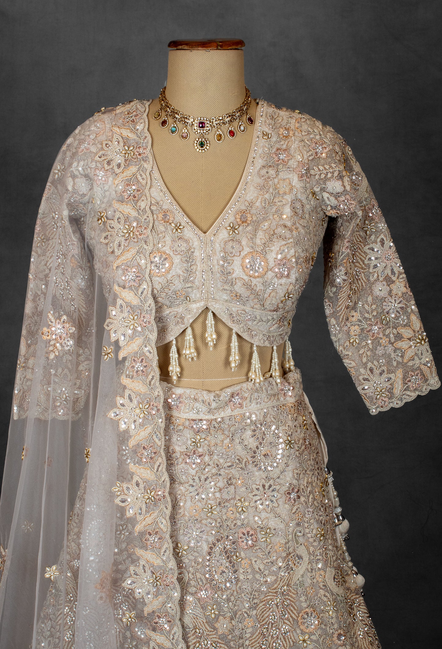 Embroidered Designer Bridal Lehenga in Pastel Beige with Sequins & Zari Work