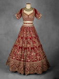 Classic Red Bridal Lehenga with Heavy Golden Embroidery and Net Dupatta