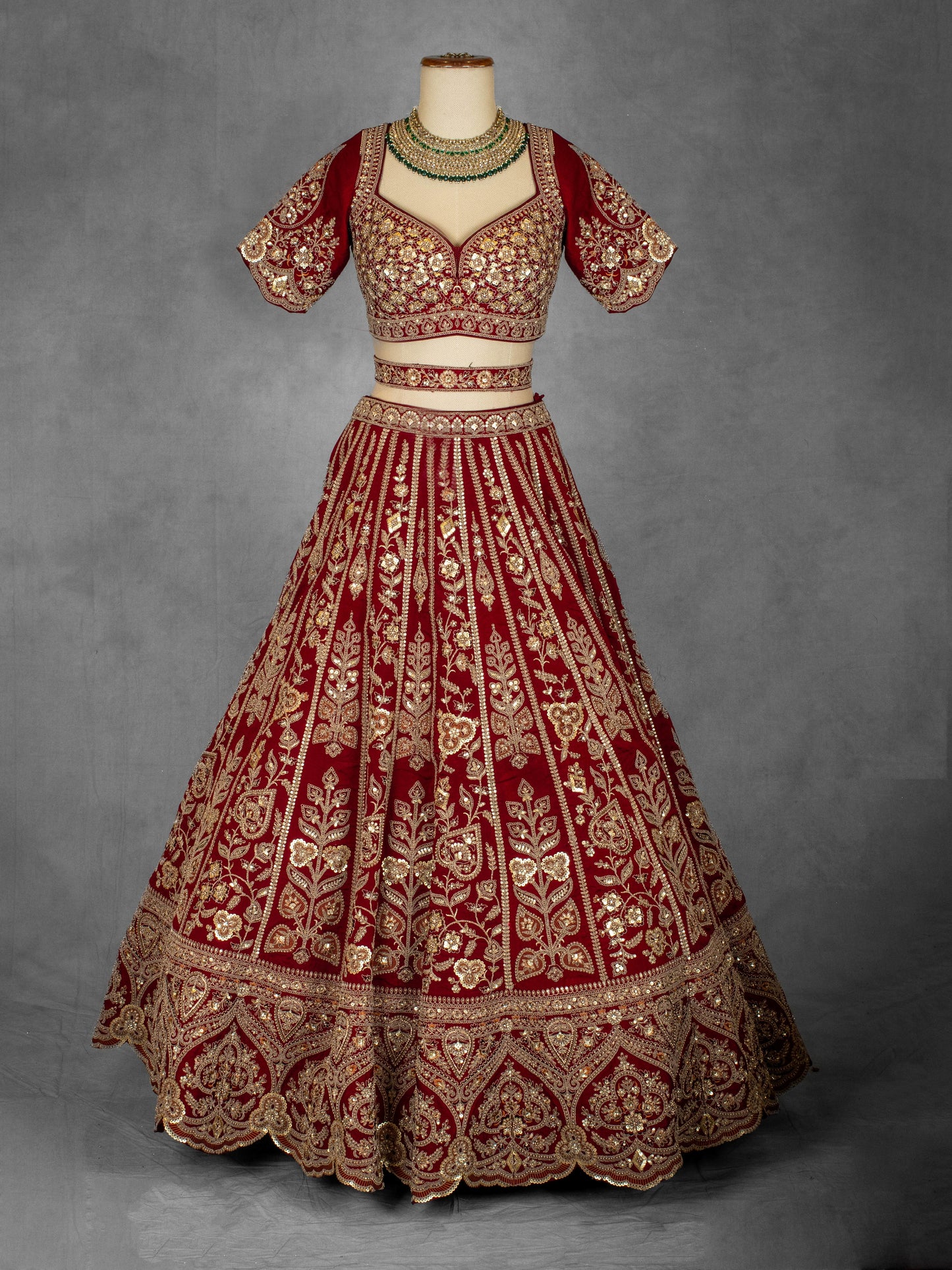 Classic Red Bridal Lehenga with Heavy Golden Embroidery and Net Dupatta