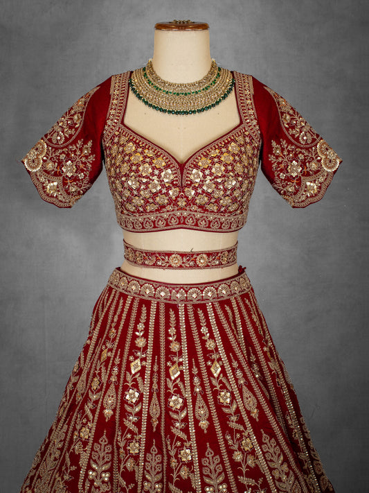 Classic red bridal lehenga with heavy golden embroidery – product image 2