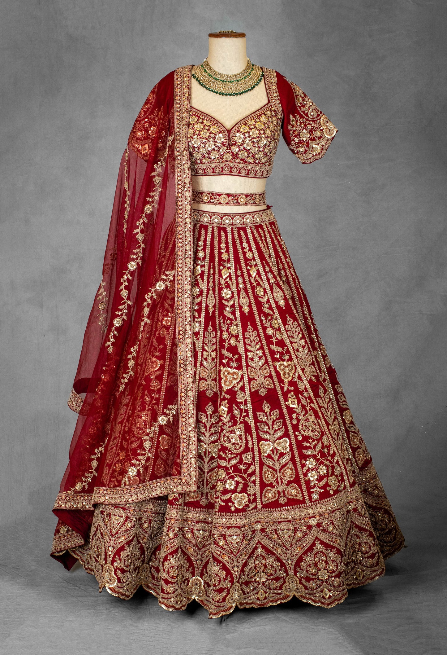 Classic Red Bridal Lehenga with Heavy Golden Embroidery and Net Dupatta