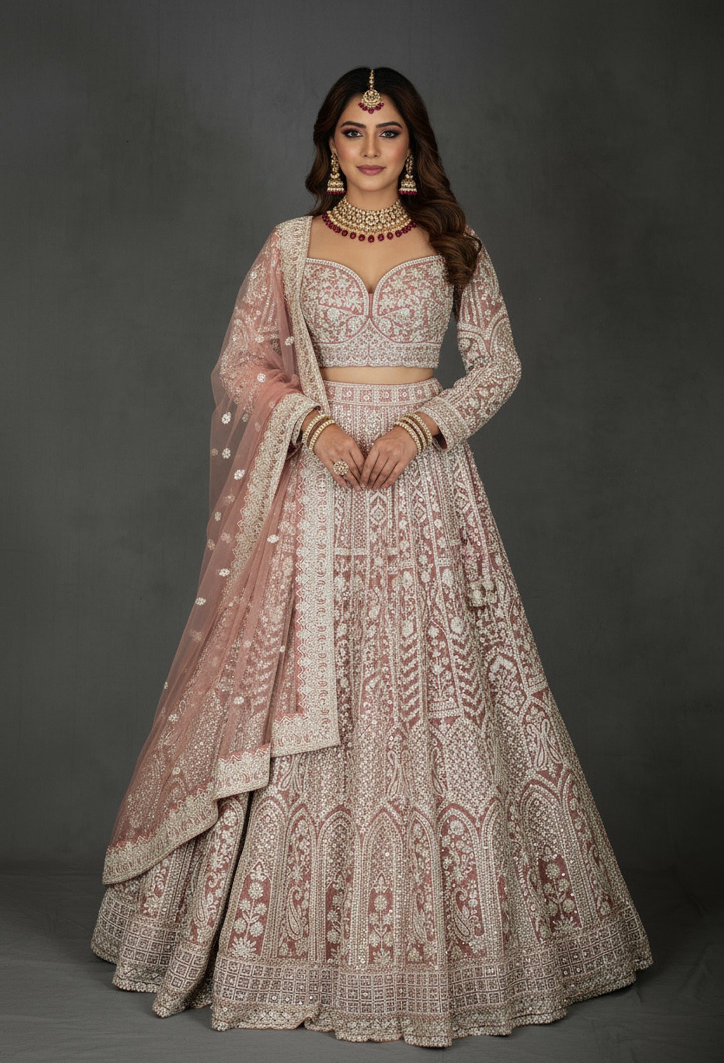 Designer Bridal Lehenga in Blush Pink with Heavy Embroidery and Net Dupatta