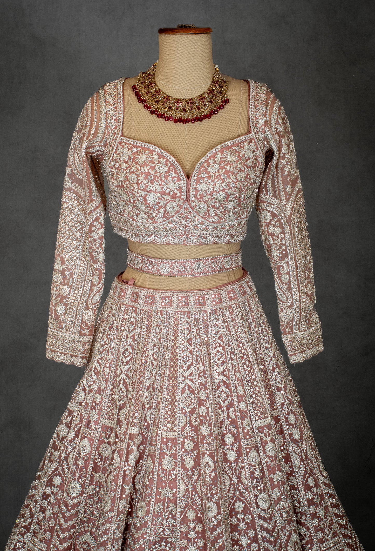 Designer Bridal Lehenga in Blush Pink with Heavy Embroidery and Net Dupatta
