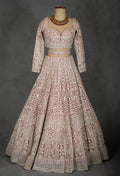 Designer Bridal Lehenga in Blush Pink with Heavy Embroidery and Net Dupatta