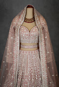 Designer Bridal Lehenga in Blush Pink with Heavy Embroidery and Net Dupatta