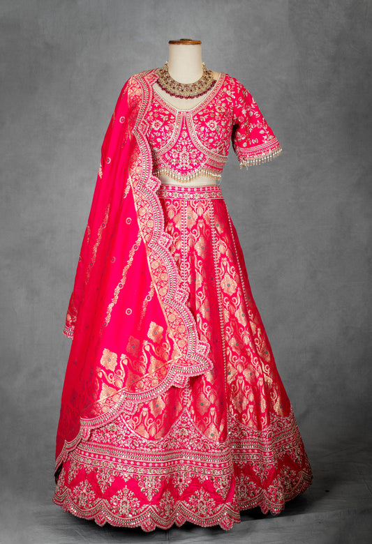 Vibrant Pink Bridal Lehenga with Golden Zari Embroidery and Designer Blouse