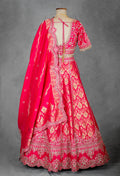 Vibrant Pink Bridal Lehenga with Golden Zari Embroidery and Designer Blouse