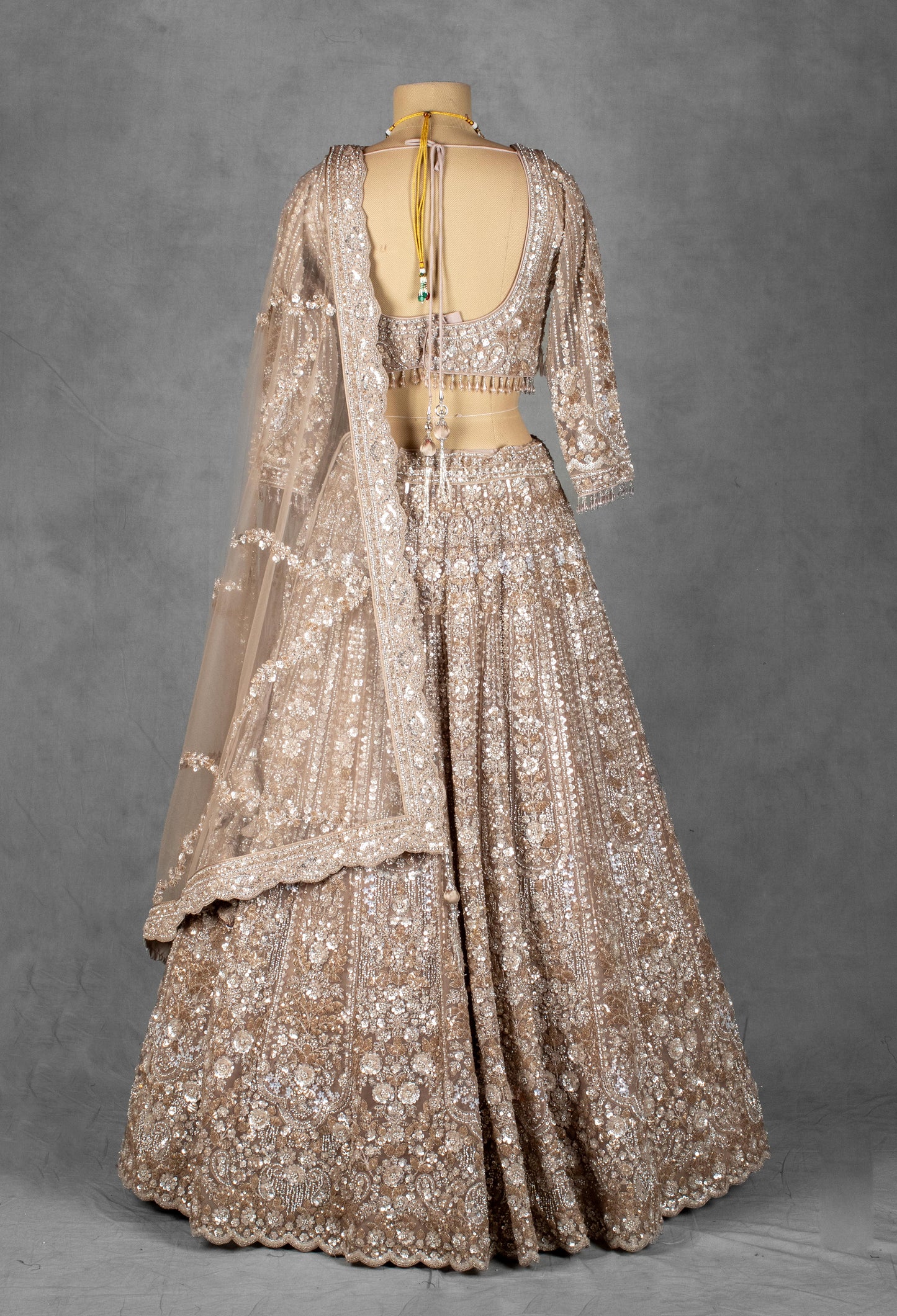 Champagne Gold Heavy Embroidered Bridal Lehenga Set with Sequin and Zari Work