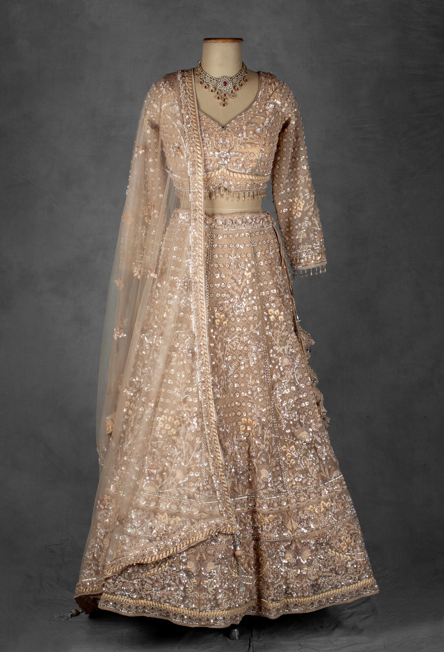 Champagne Gold Hand-Embroidered Sequin Lehenga with Sheer Dupatta & Full Sleeves Blouse