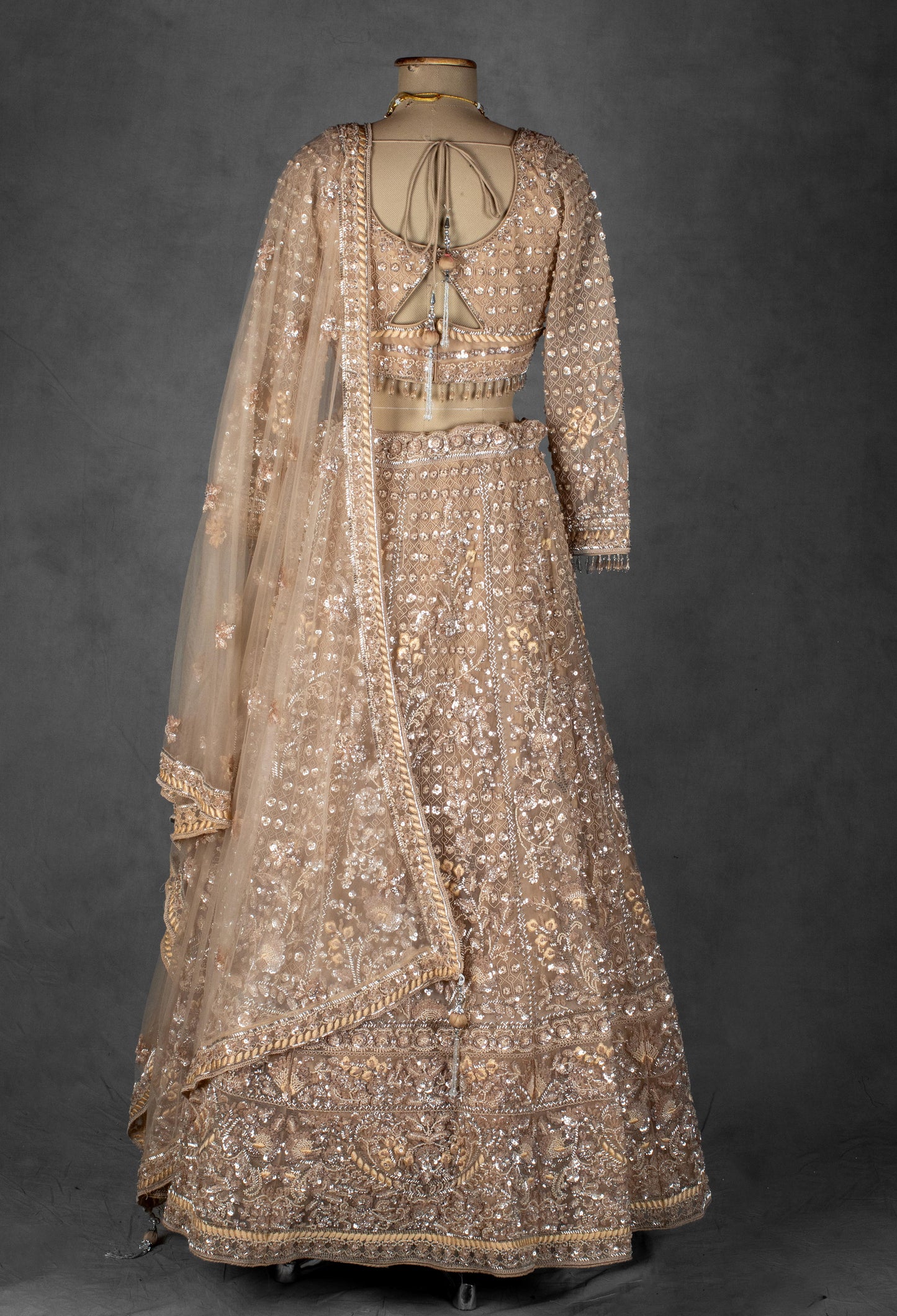Champagne Gold Hand-Embroidered Sequin Lehenga with Sheer Dupatta & Full Sleeves Blouse