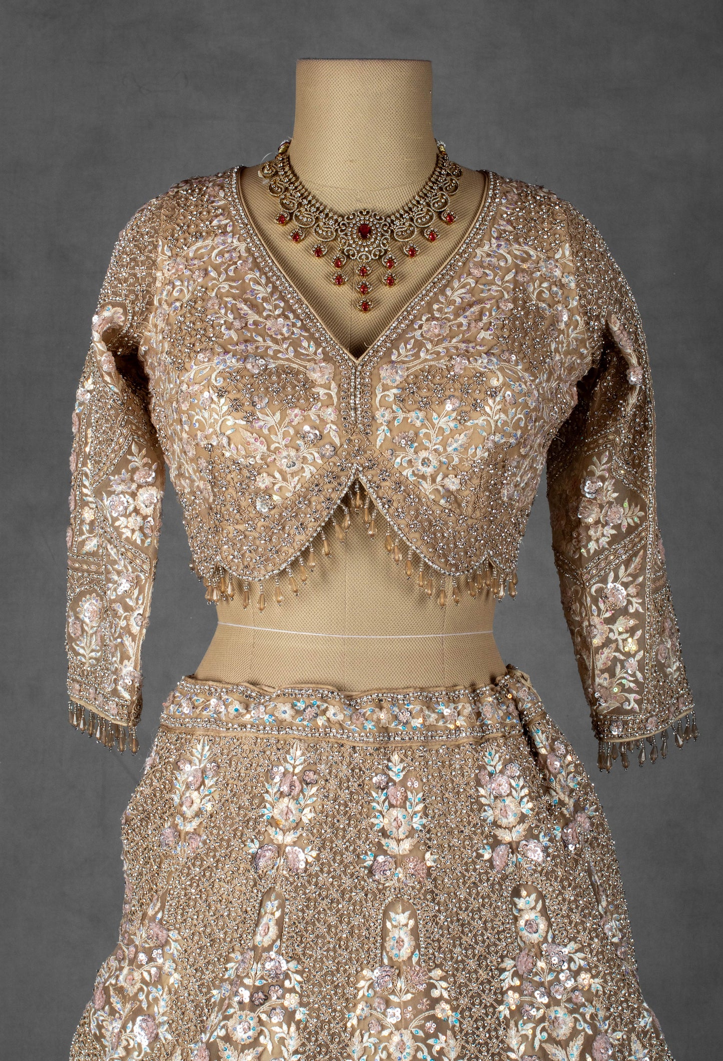 Nude Gold Embellished Lehenga Set with Full Sleeve Crop Top & Net Dupatta