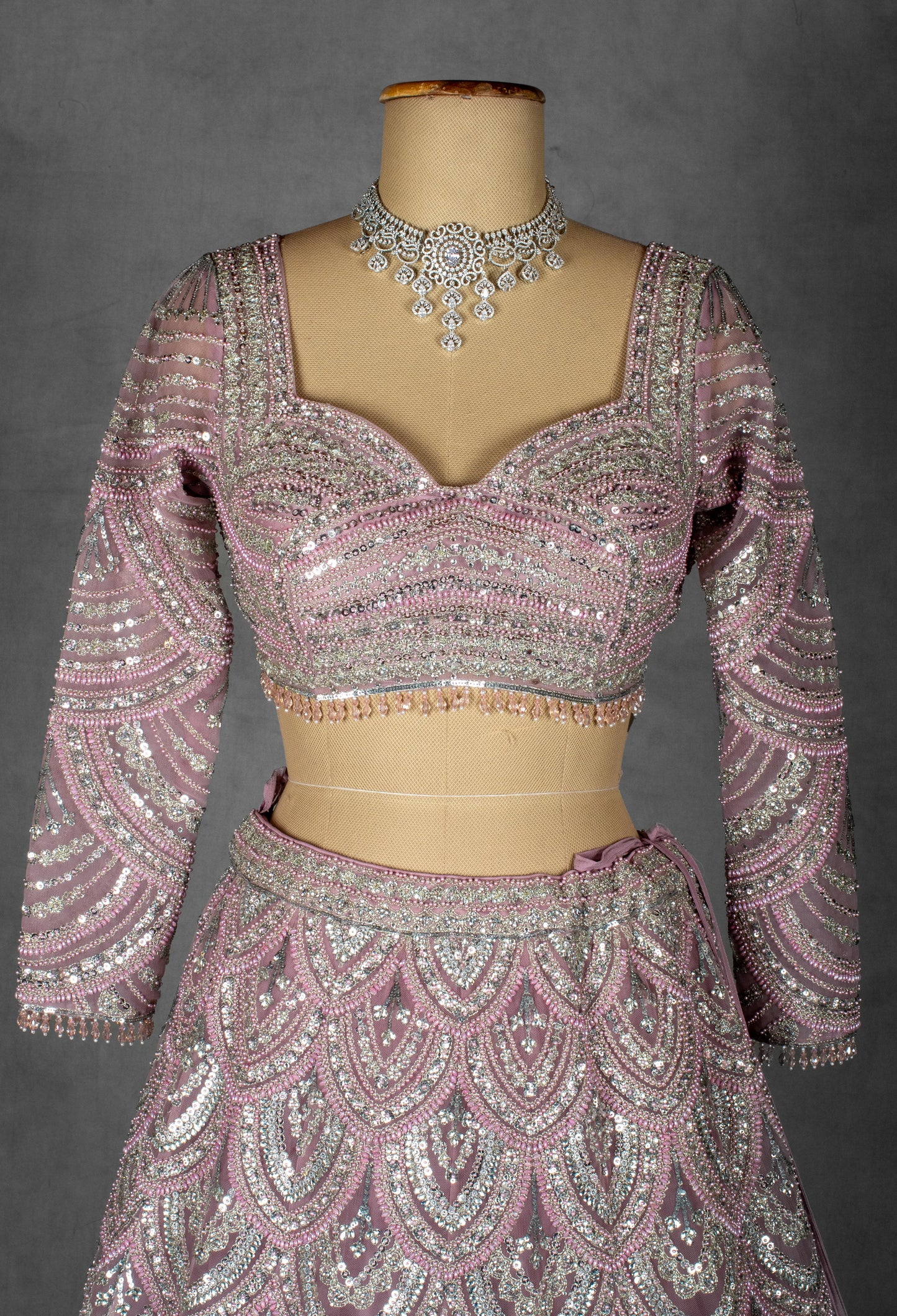 Blush Pink Sequin Embellished Bridal Lehenga Set with Net Dupatta and Full Sleeves