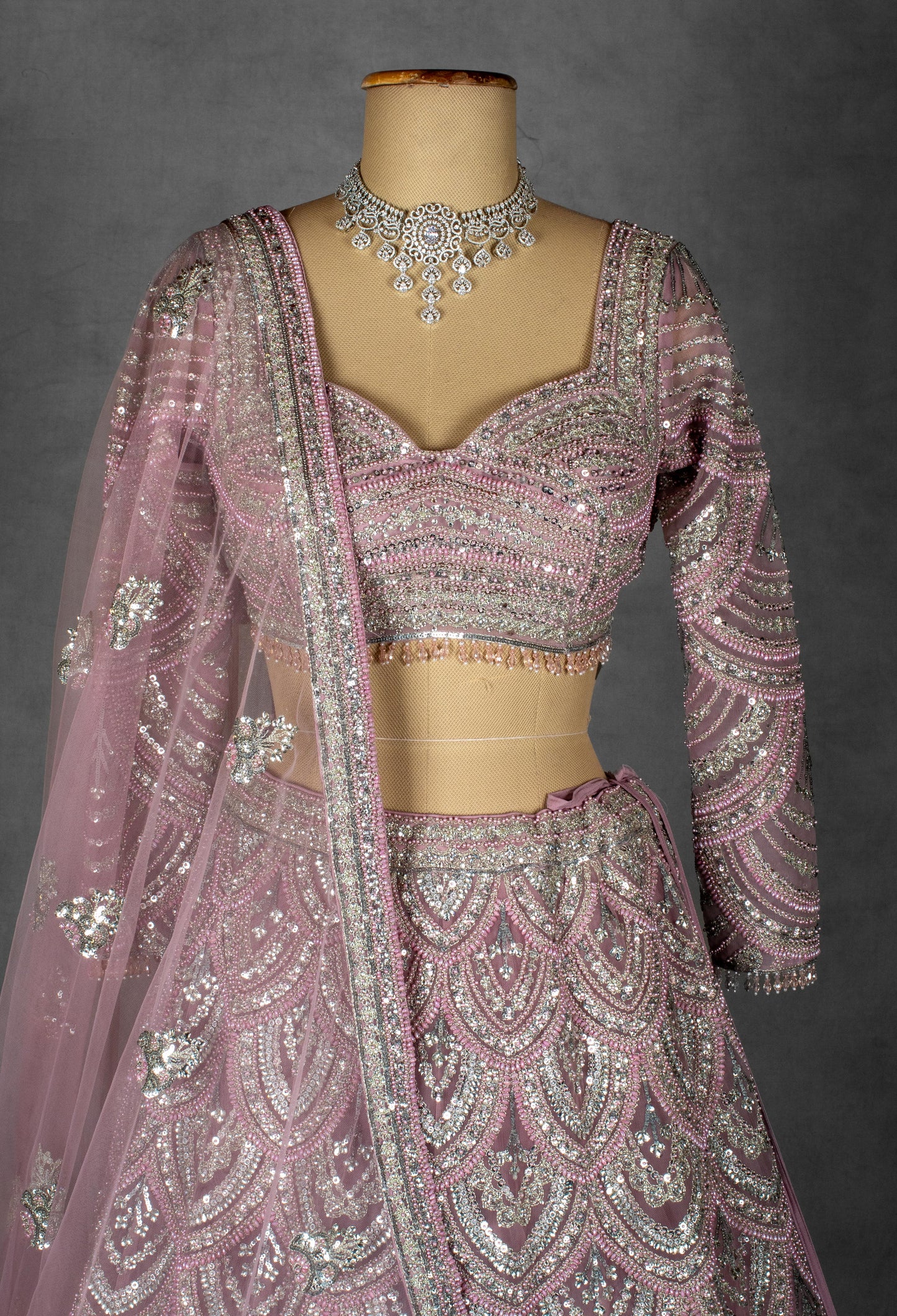Blush Pink Sequin Embellished Bridal Lehenga Set with Net Dupatta and Full Sleeves