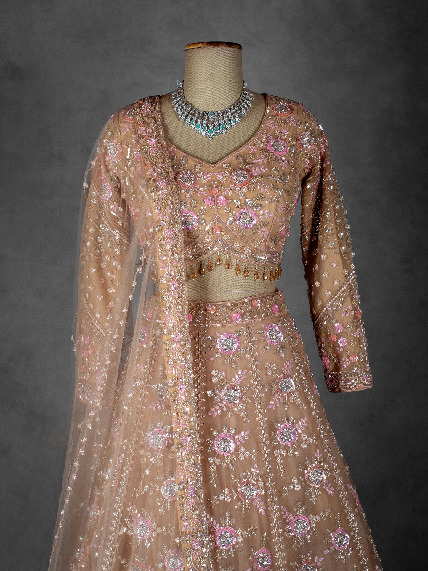 Blush Peach Floral Embroidered Crop Top Lehenga Set in Net with Sequin & Thread Work